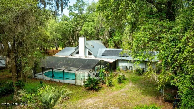a view of a backyard with garden
