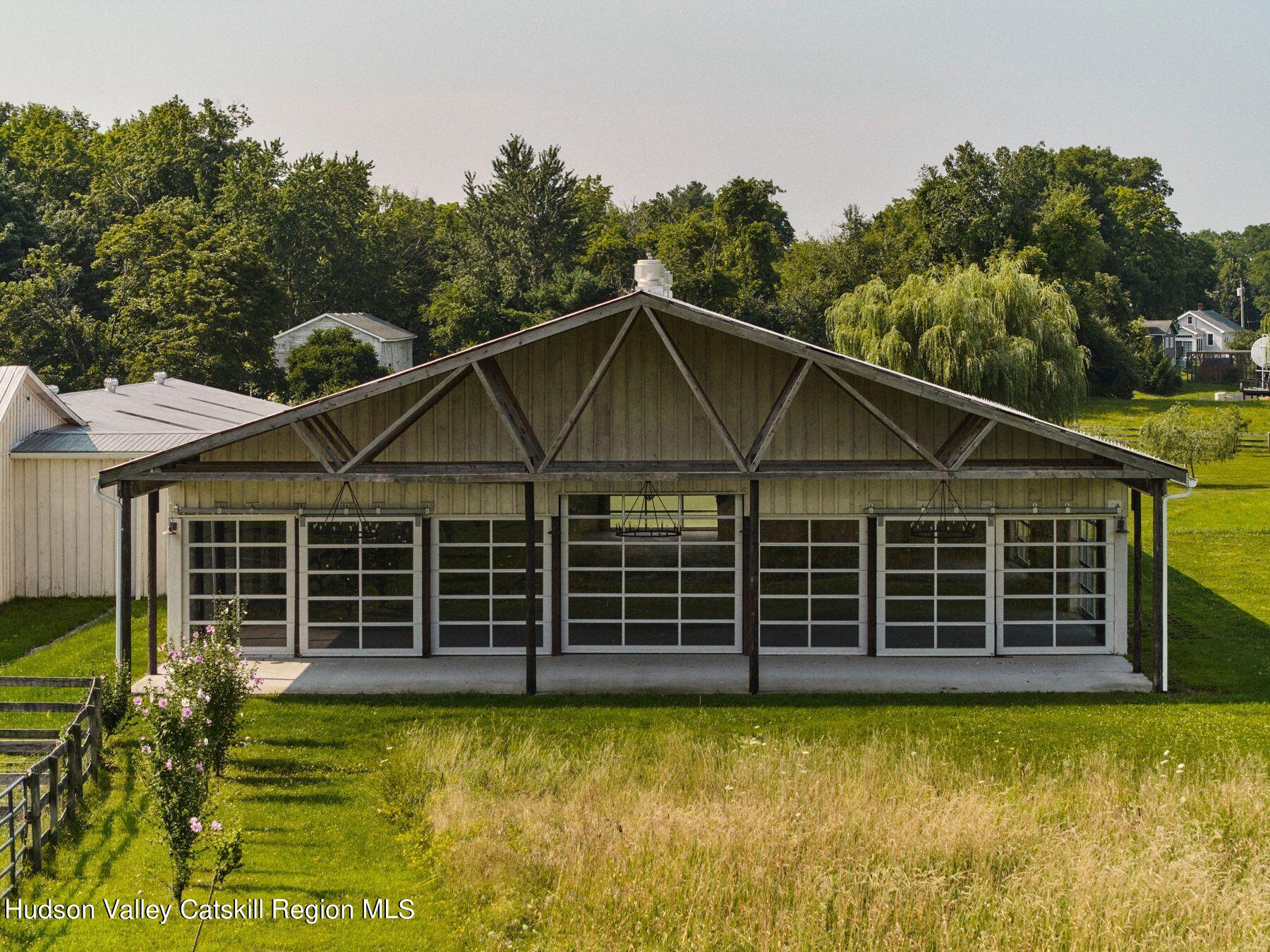 356 Co Rte 6 Germantown, NY 12526 - Photo 13 of 52 a front view of a house with a garden