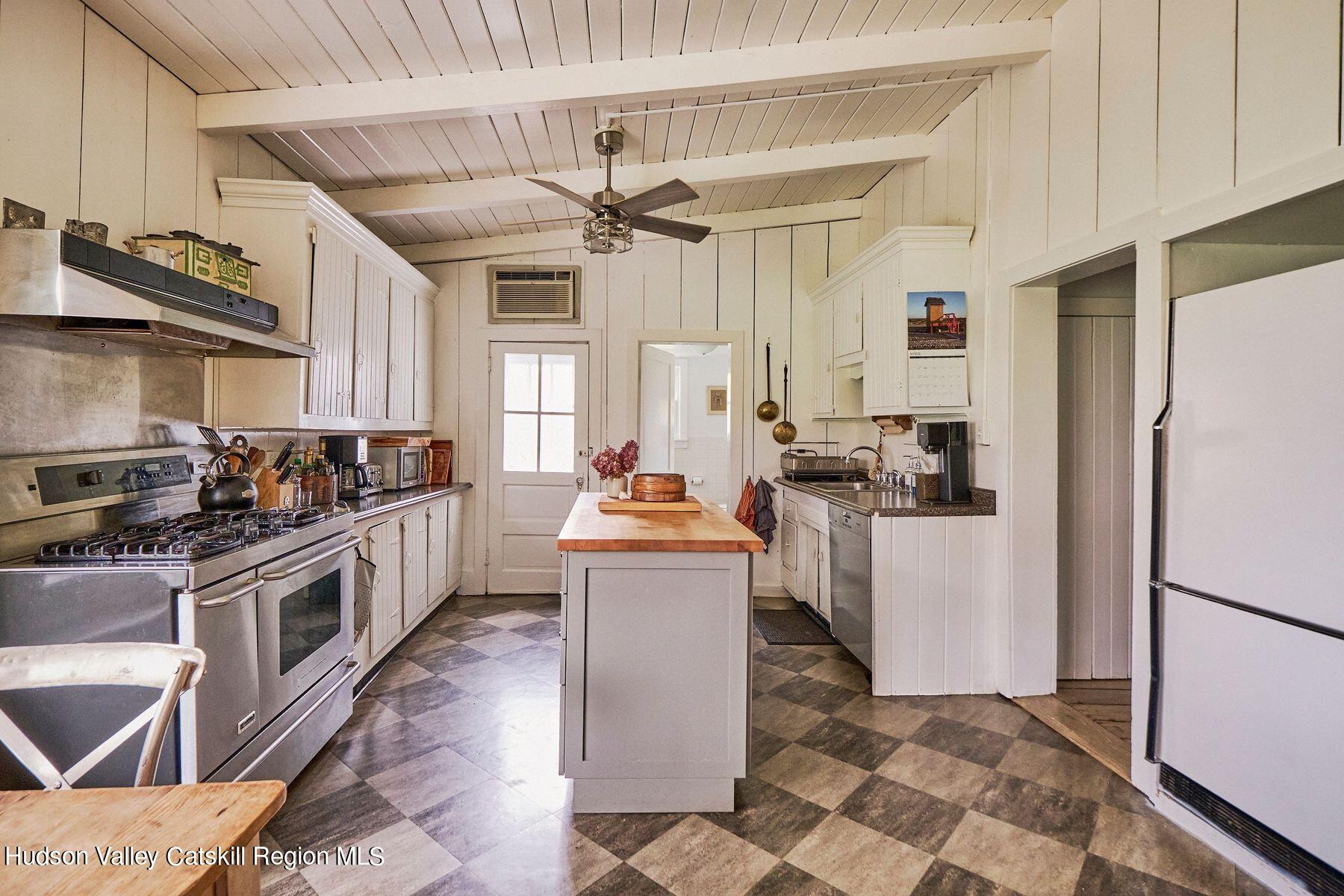 356 Co Rte 6 Germantown, NY 12526 - Photo 22 of 52 a kitchen with stainless steel appliances a stove a sink and a refrigerator