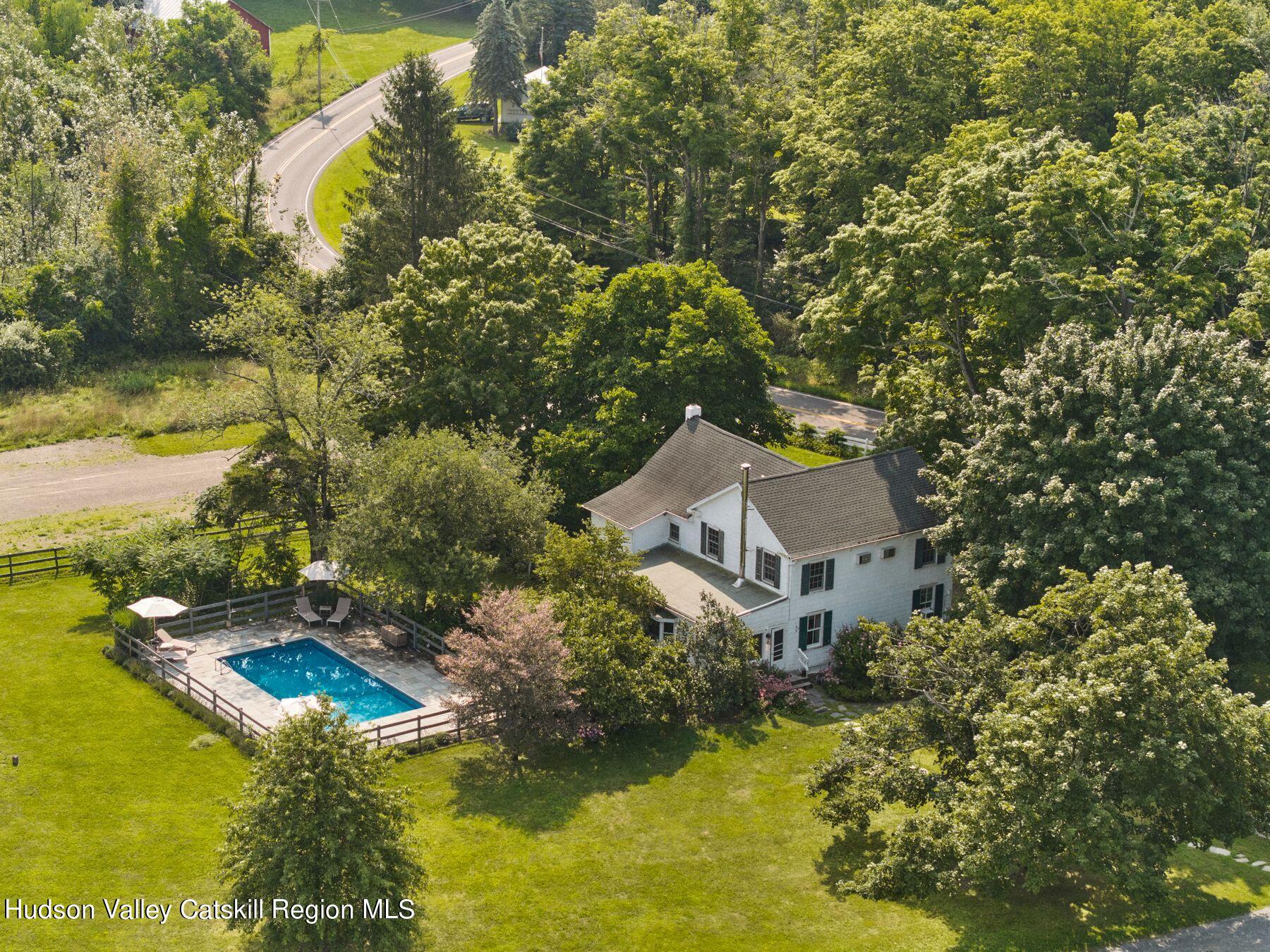 356 Co Rte 6 Germantown, NY 12526 - Photo 3 of 52 an aerial view of a house with a garden and swimming pool