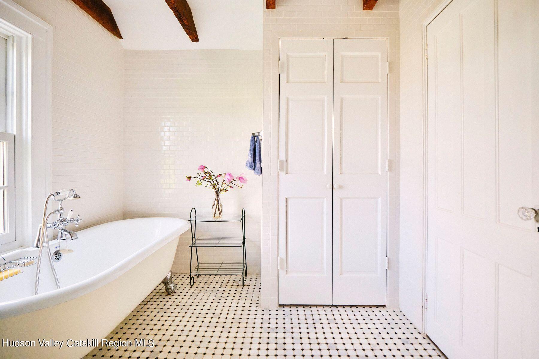 356 Co Rte 6 Germantown, NY 12526 - Photo 34 of 52 a bathroom with a bathtub and a shower