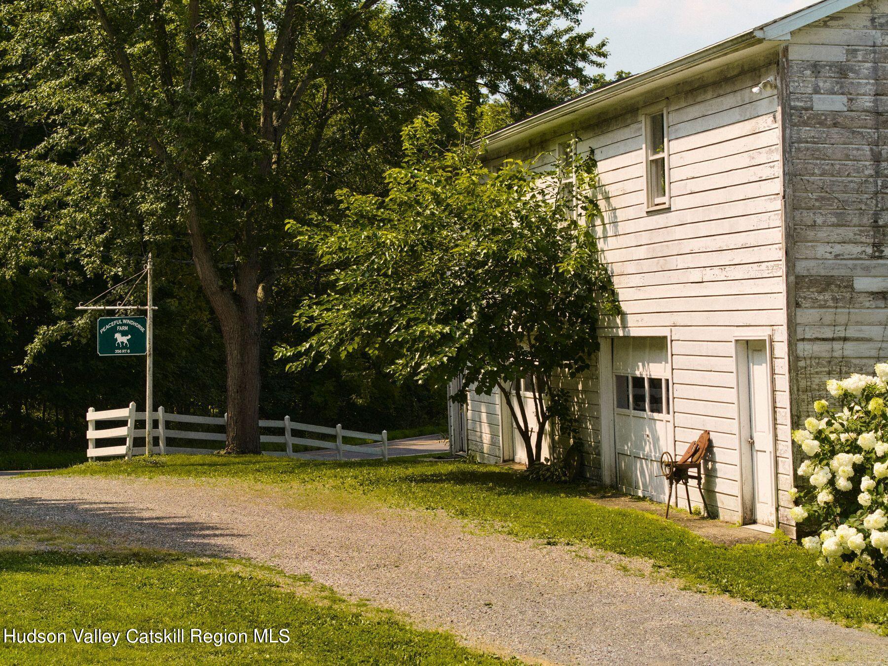356 Co Rte 6 Germantown, NY 12526 - Photo 37 of 52 a view of a house with a backyard and a tree