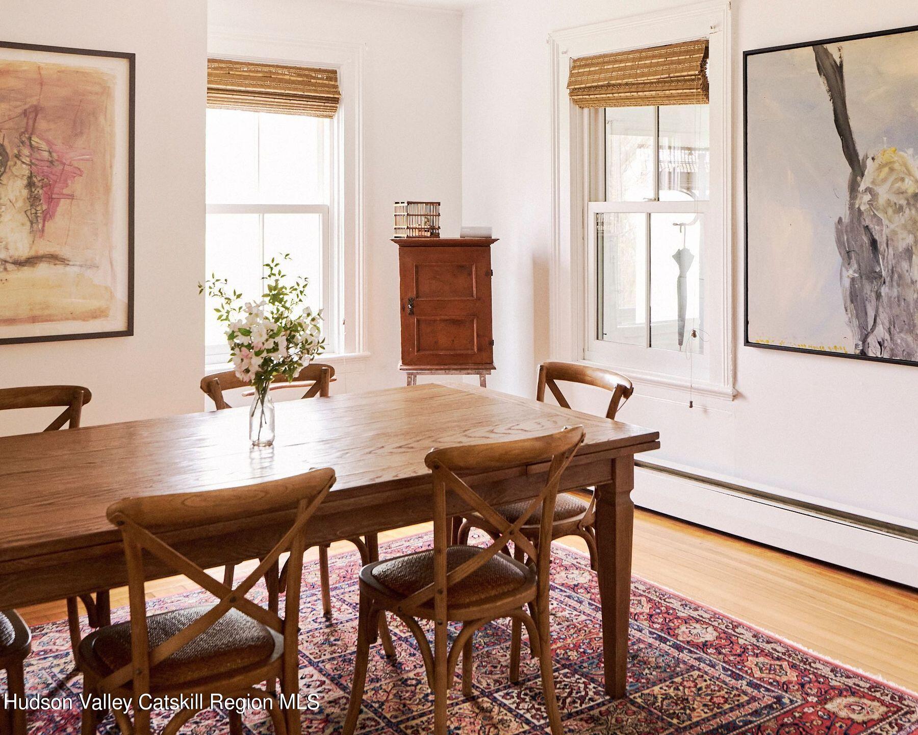 356 Co Rte 6 Germantown, NY 12526 - Photo 5 of 52 a view of a dining room with furniture and a window