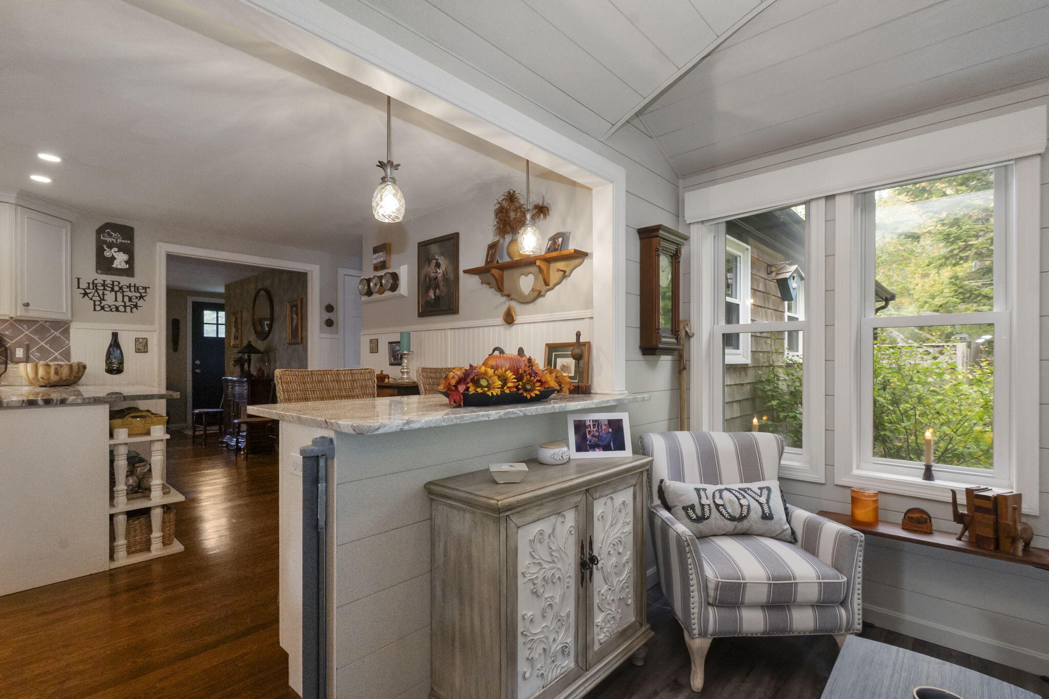 8 Jib Way Hyannis, MA 02601 - Photo 15 of 40 a kitchen with stainless steel appliances granite countertop a sink stove and wooden floor