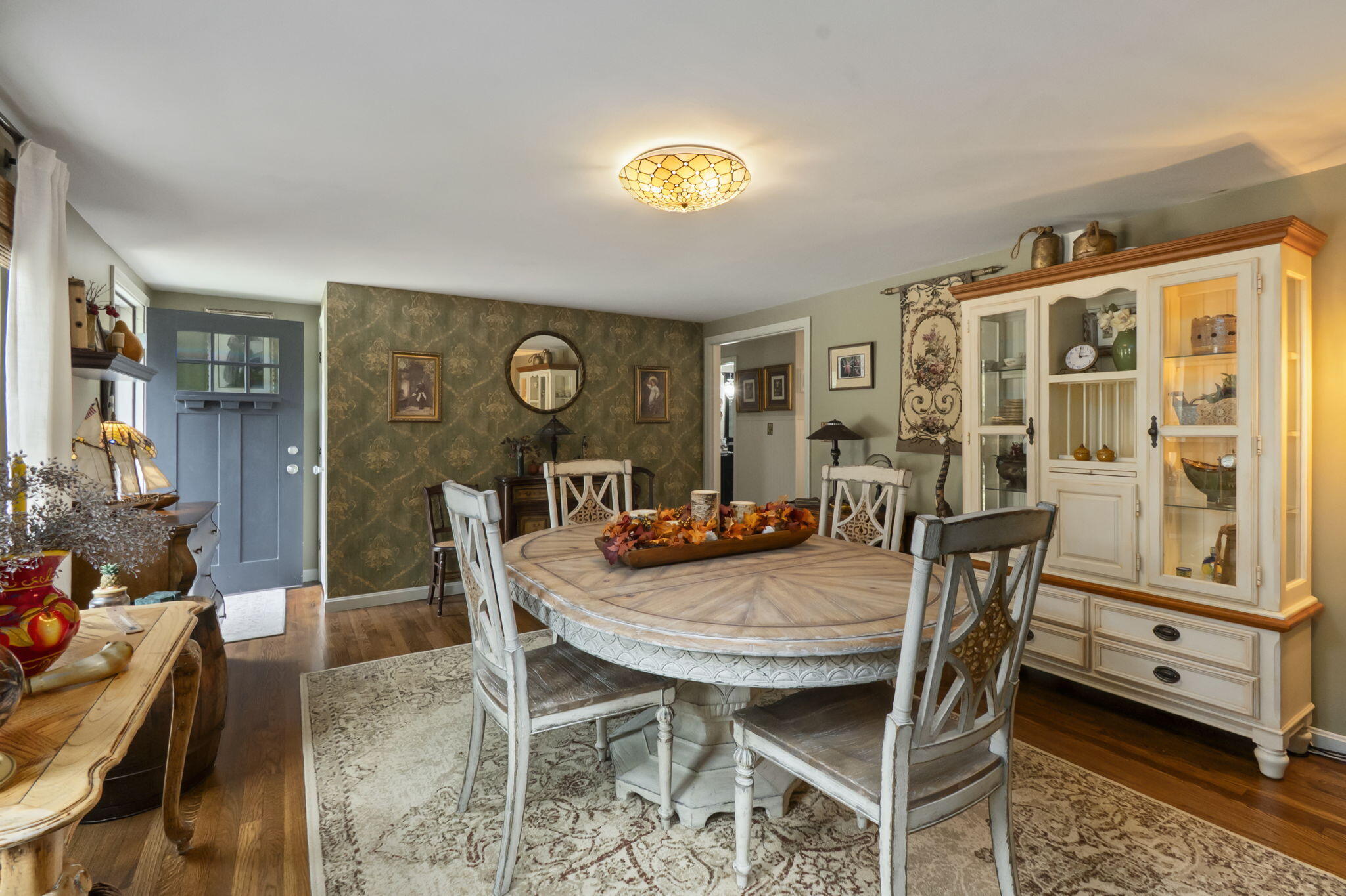 8 Jib Way Hyannis, MA 02601 - Photo 3 of 40 a view of a dining room with furniture and chandelier