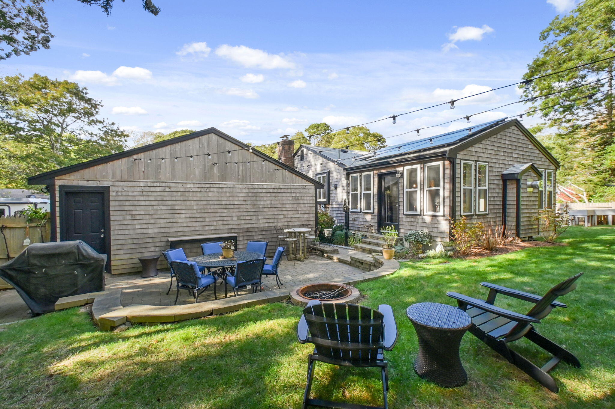 8 Jib Way Hyannis, MA 02601 - Photo 32 of 40 a view of a house with backyard sitting area and garden