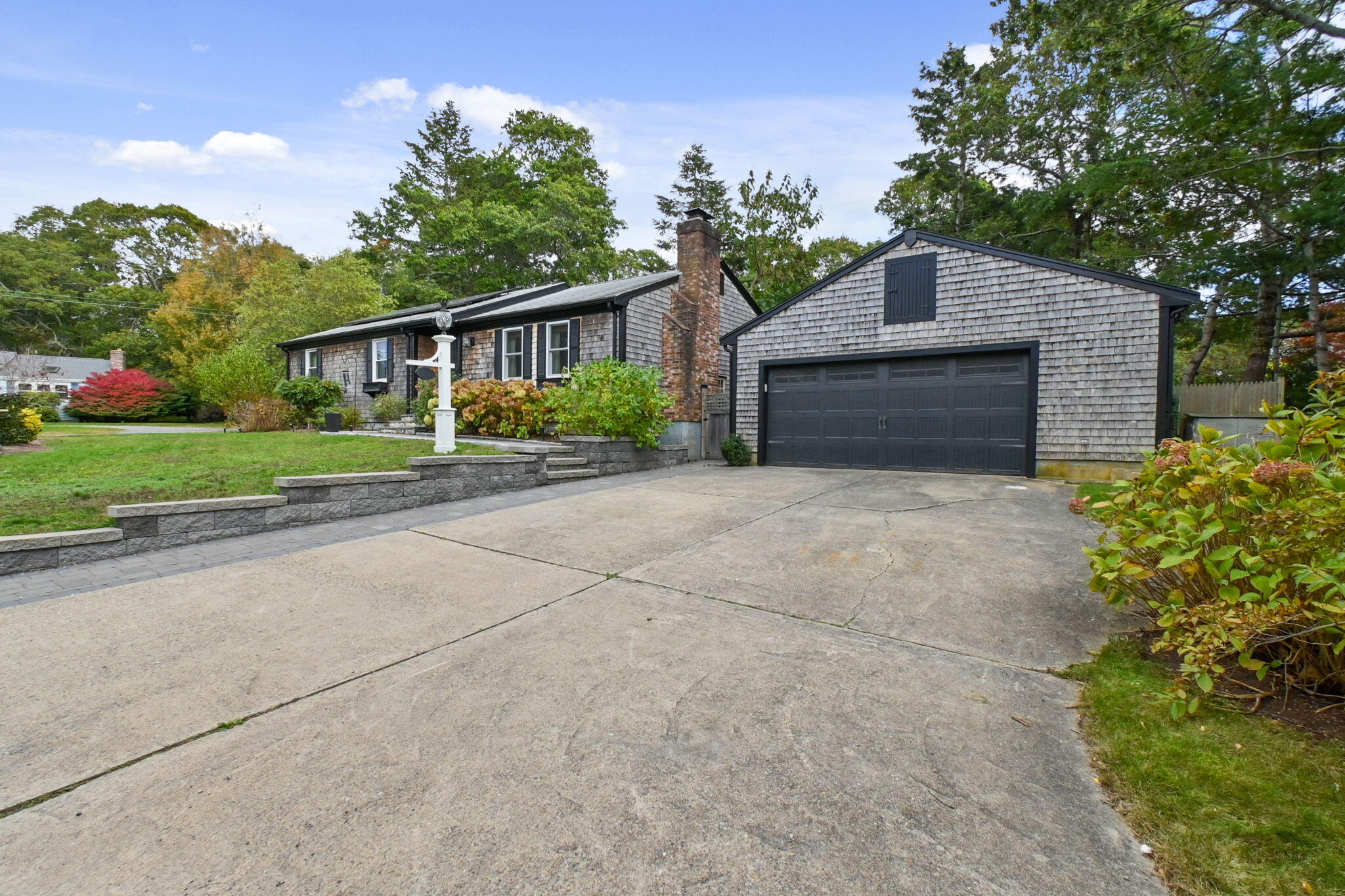 8 Jib Way Hyannis, MA 02601 - Photo 40 of 40 a front view of house with yard and trees in the background