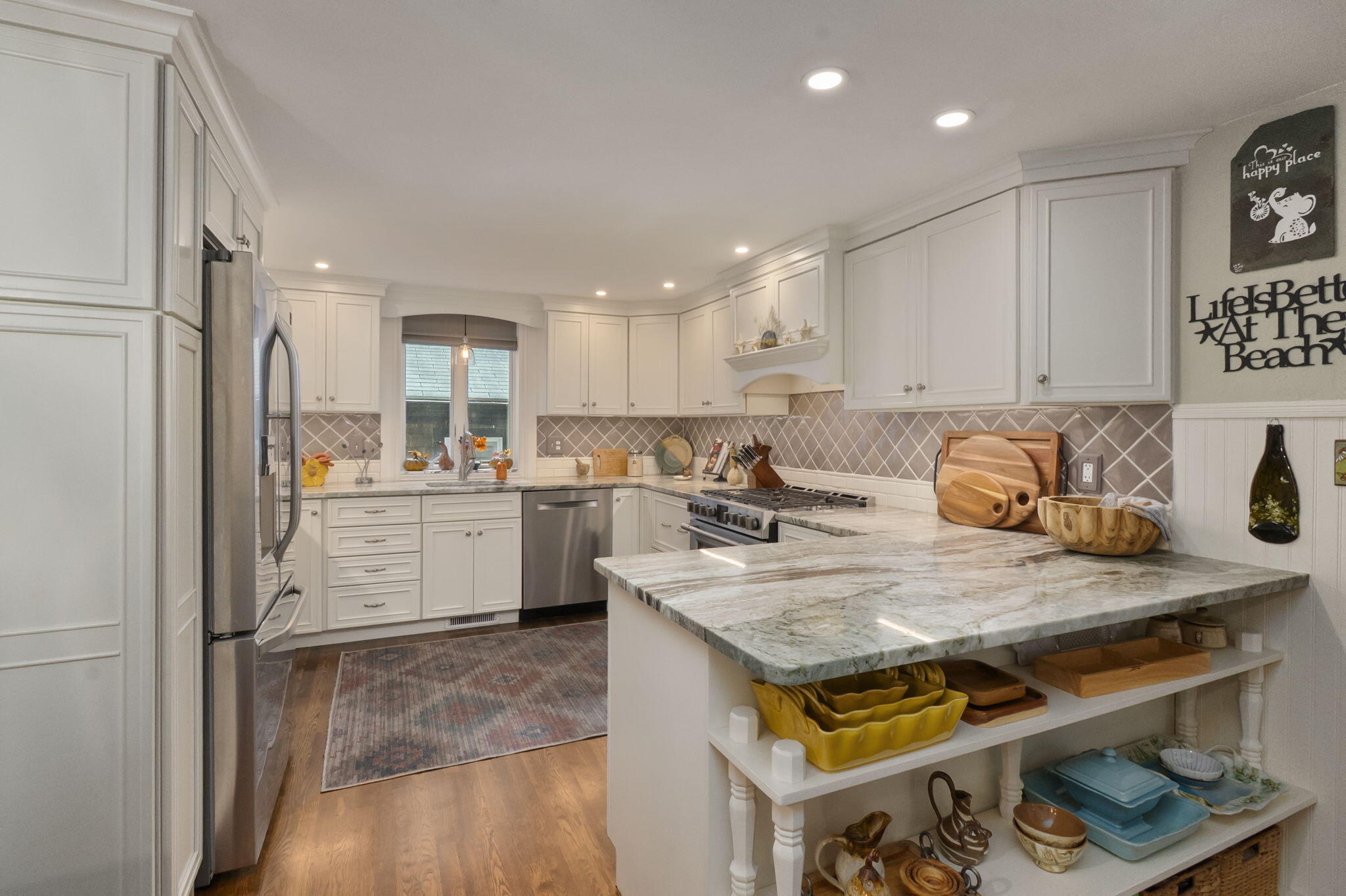 8 Jib Way Hyannis, MA 02601 - Photo 6 of 40 a kitchen with a stove and a refrigerator