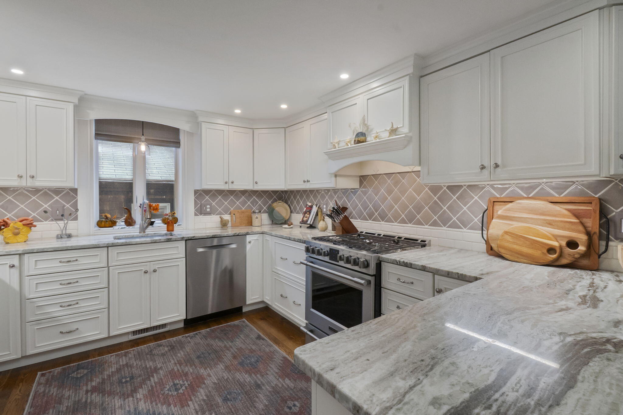8 Jib Way Hyannis, MA 02601 - Photo 7 of 40 a kitchen with granite countertop cabinets stainless steel appliances and a sink