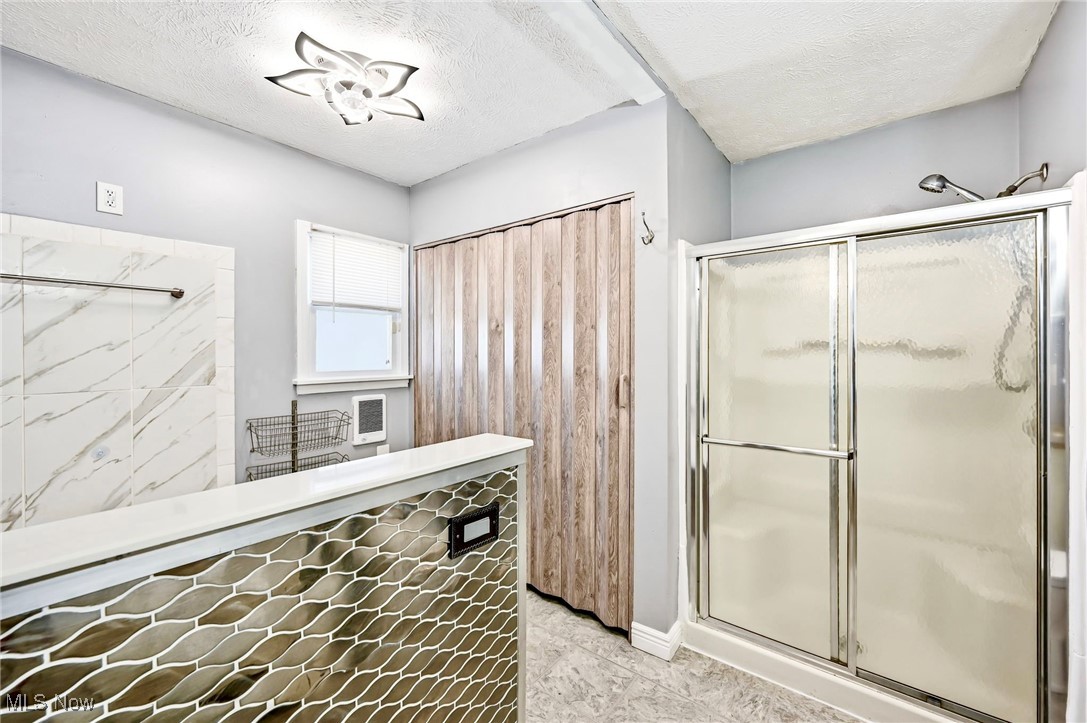 245 North Road Niles, OH 44446 - Photo 22 of 45 Full bath featuring a textured ceiling and a stall shower