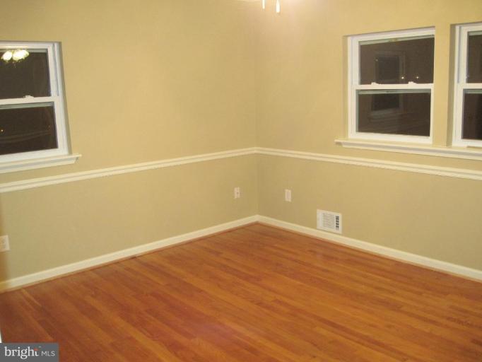 3409 Reedy Drive Annandale, VA 22003 - Photo 14 of 30 a view of empty room with wooden floor and fan