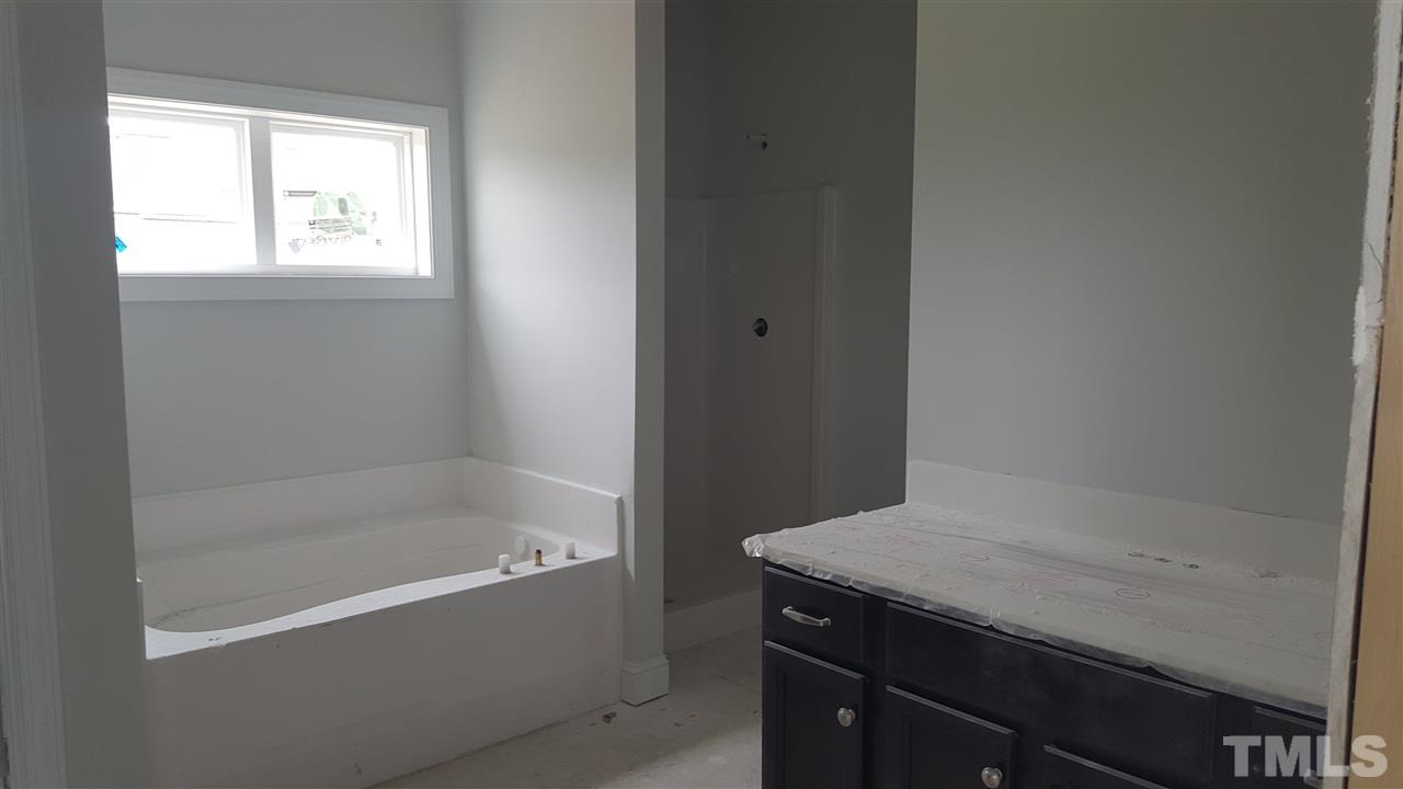 424 Seabring Lane Raleigh, NC 27603 - Photo 14 of 25 Separate vanities in master bathroom