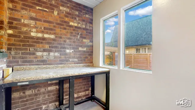 a view of a wooden floor and a window