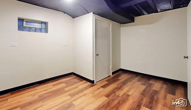 a aerial view of a house with a yard