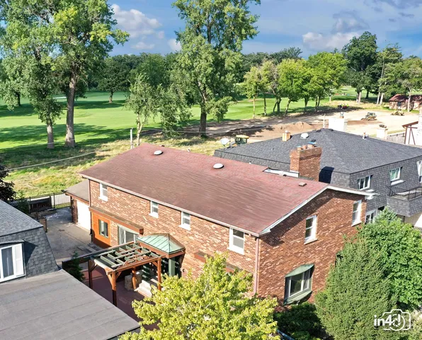 a balcony with view of an outdoor space