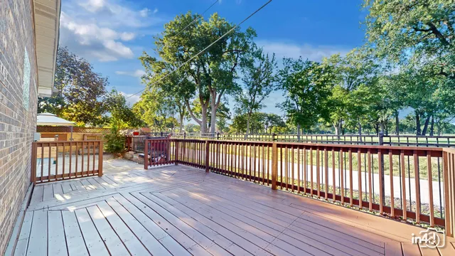 a view of a house with basketball court