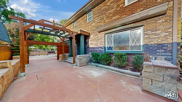 a view of a building with sitting area