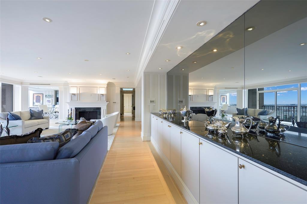 5200 Keller Springs Road, Unit 1534/36 Dallas, TX 75248 - Photo 15 of 35 a large living room with stainless steel appliances