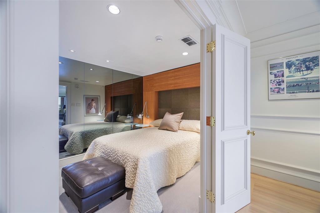 5200 Keller Springs Road, Unit 1534/36 Dallas, TX 75248 - Photo 27 of 35 a bedroom with a bed and a couch