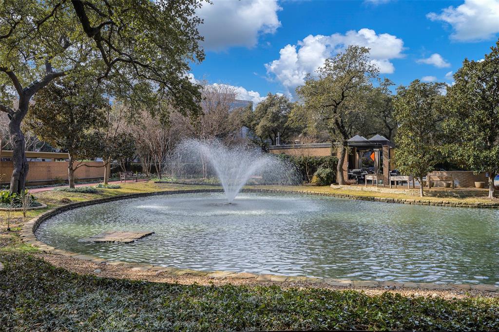 5200 Keller Springs Road, Unit 1534/36 Dallas, TX 75248 - Photo 33 of 35 a view of a house with a yard