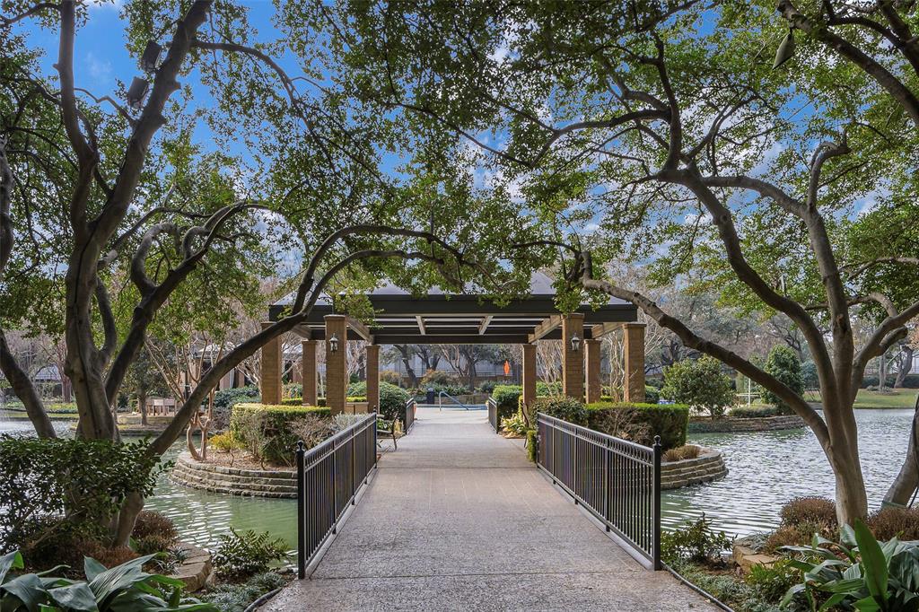 5200 Keller Springs Road, Unit 1534/36 Dallas, TX 75248 - Photo 34 of 35 a view of house with outdoor space and sitting area