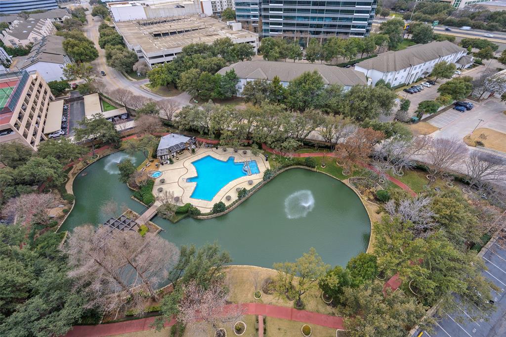 5200 Keller Springs Road, Unit 1534/36 Dallas, TX 75248 - Photo 4 of 35 an aerial view of a house with a lake view