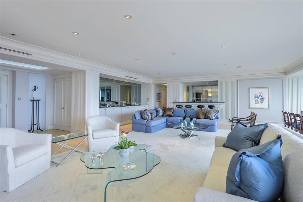 5200 Keller Springs Road, Unit 1534/36 Dallas, TX 75248 - Photo 5 of 35 a living room with furniture and a table