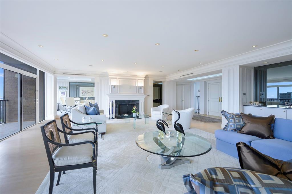 5200 Keller Springs Road, Unit 1534/36 Dallas, TX 75248 - Photo 7 of 35 a living room with furniture and a fireplace