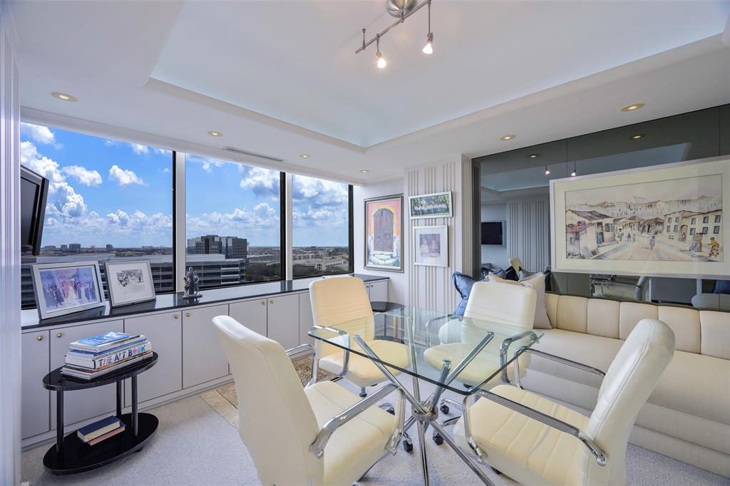 5200 Keller Springs Road, Unit 1534/36 Dallas, TX 75248 - Photo 8 of 35 a living room with furniture and a large window