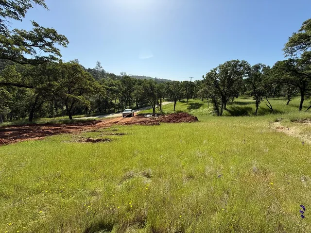 a view of a swimming pool with an outdoor space and seating area
