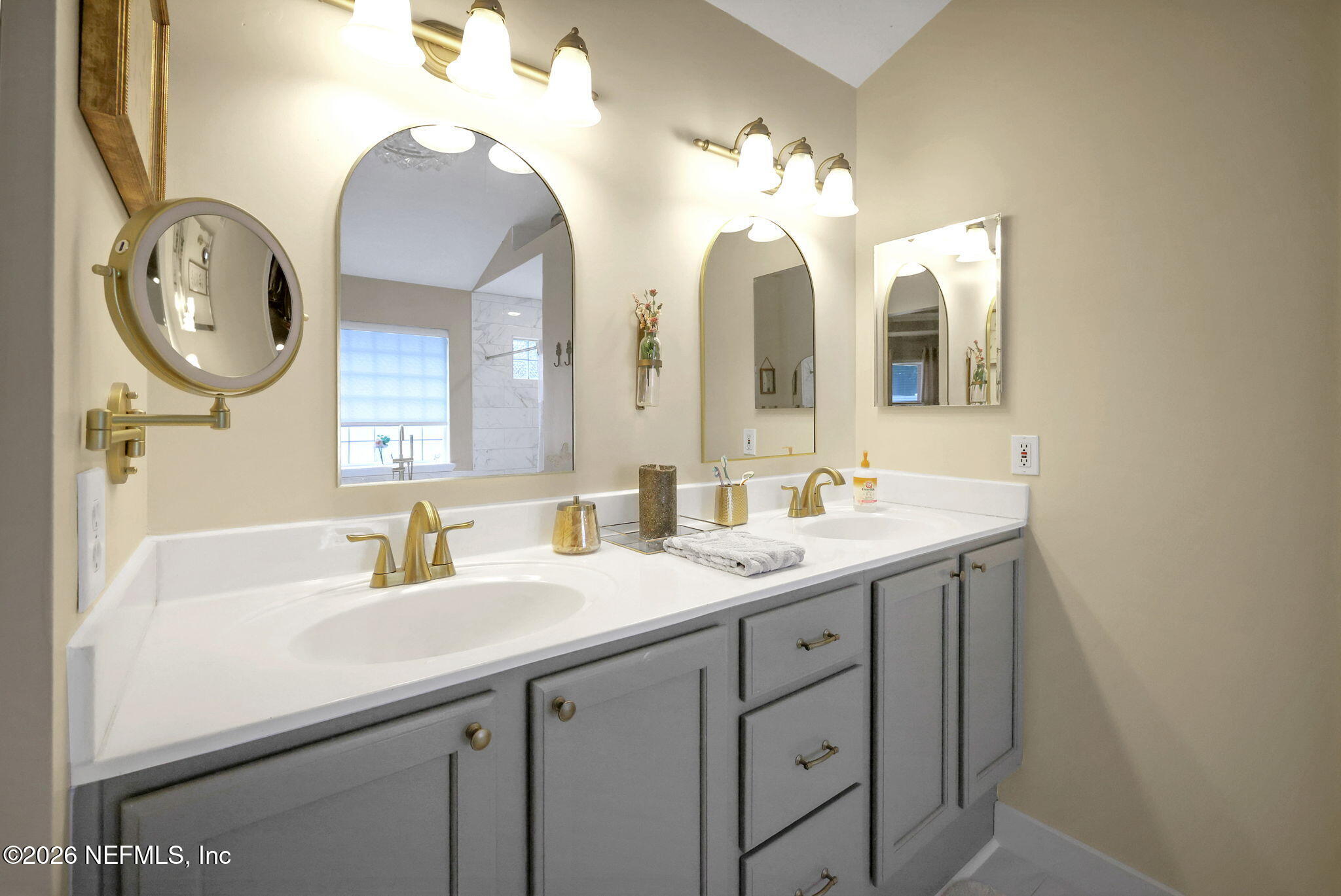 4320 Rye Court St. Johns, FL 32259 - Photo 32 of 60 a bathroom with a double vanity sink and a mirror
