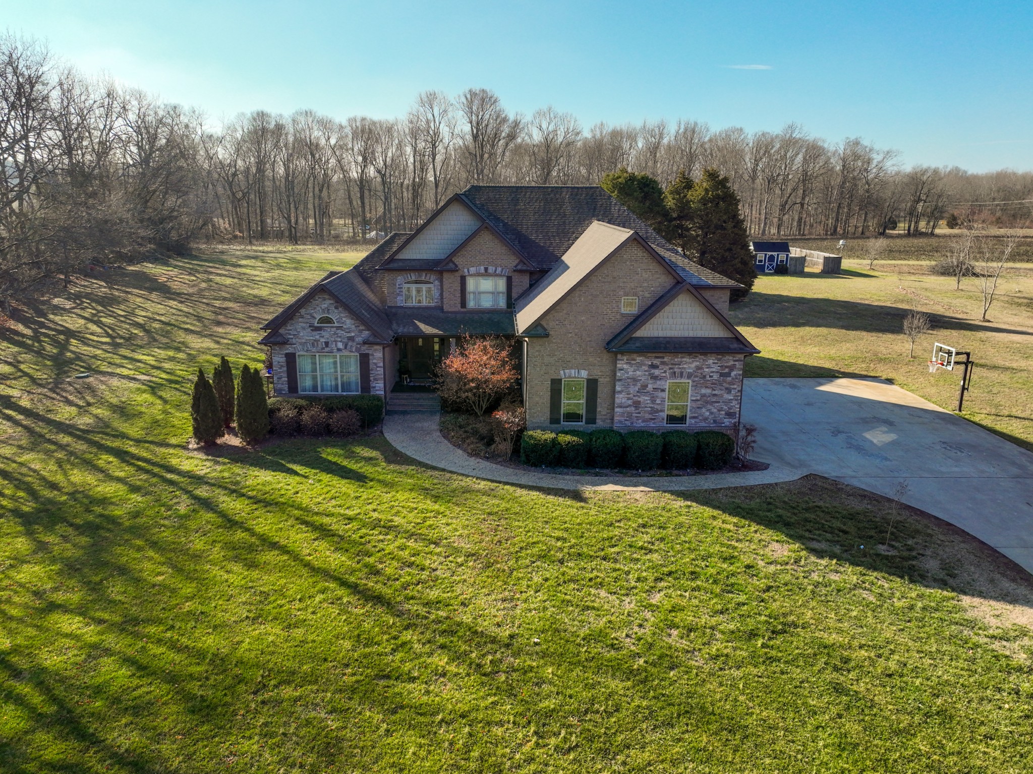 4570 Sango Road Clarksville, TN 37043 - Photo 1 of 32 a front view of a house with garden
