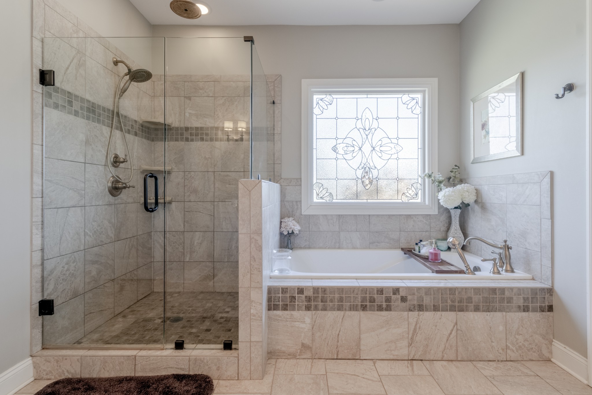 4570 Sango Road Clarksville, TN 37043 - Photo 11 of 32 a bathroom with a granite countertop bathtub shower and window