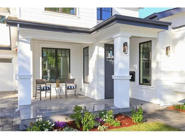 a front view of a house with patio