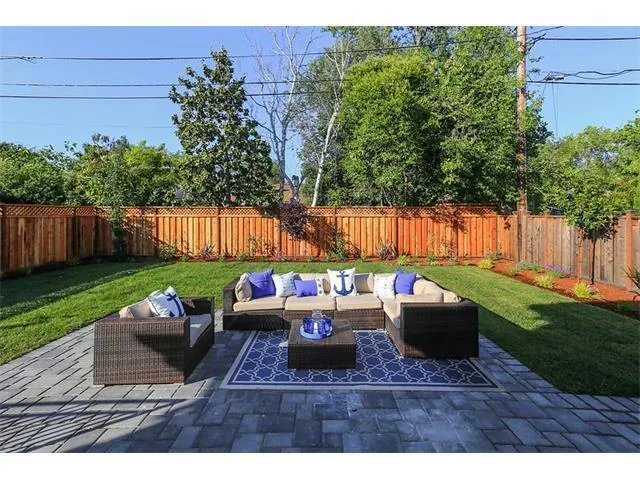 a view of yard with outdoor seating