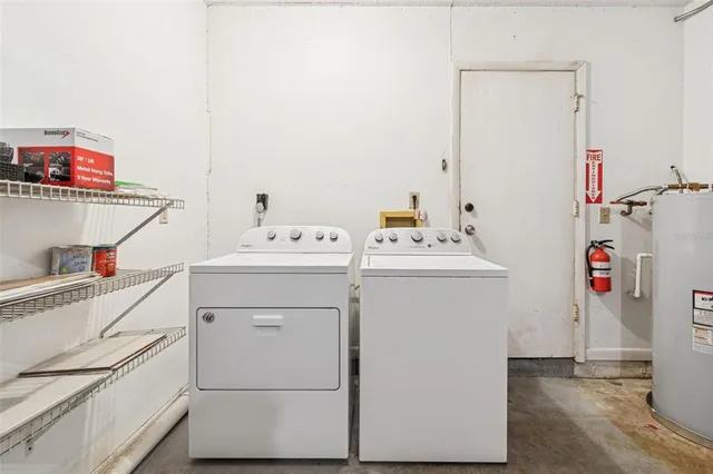 a utility room with dryer and washer