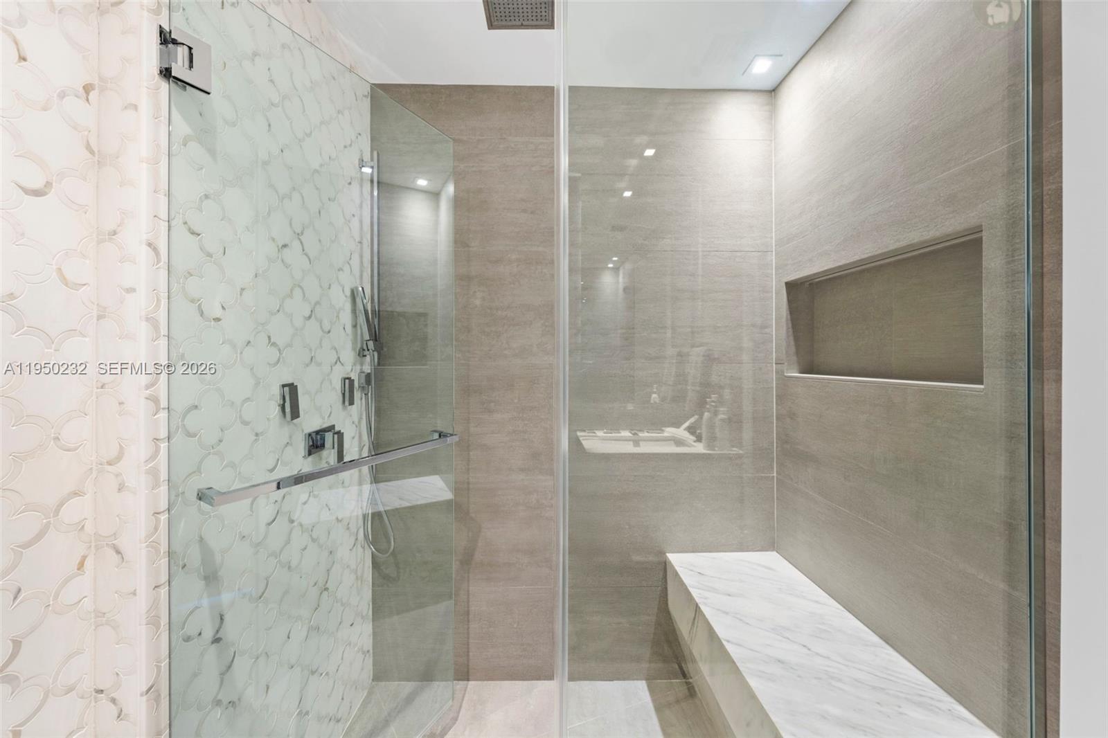 1000 South Pointe Drive, Unit 2802 Miami Beach, FL 33139 - Photo 31 of 44 a bathroom with a shower