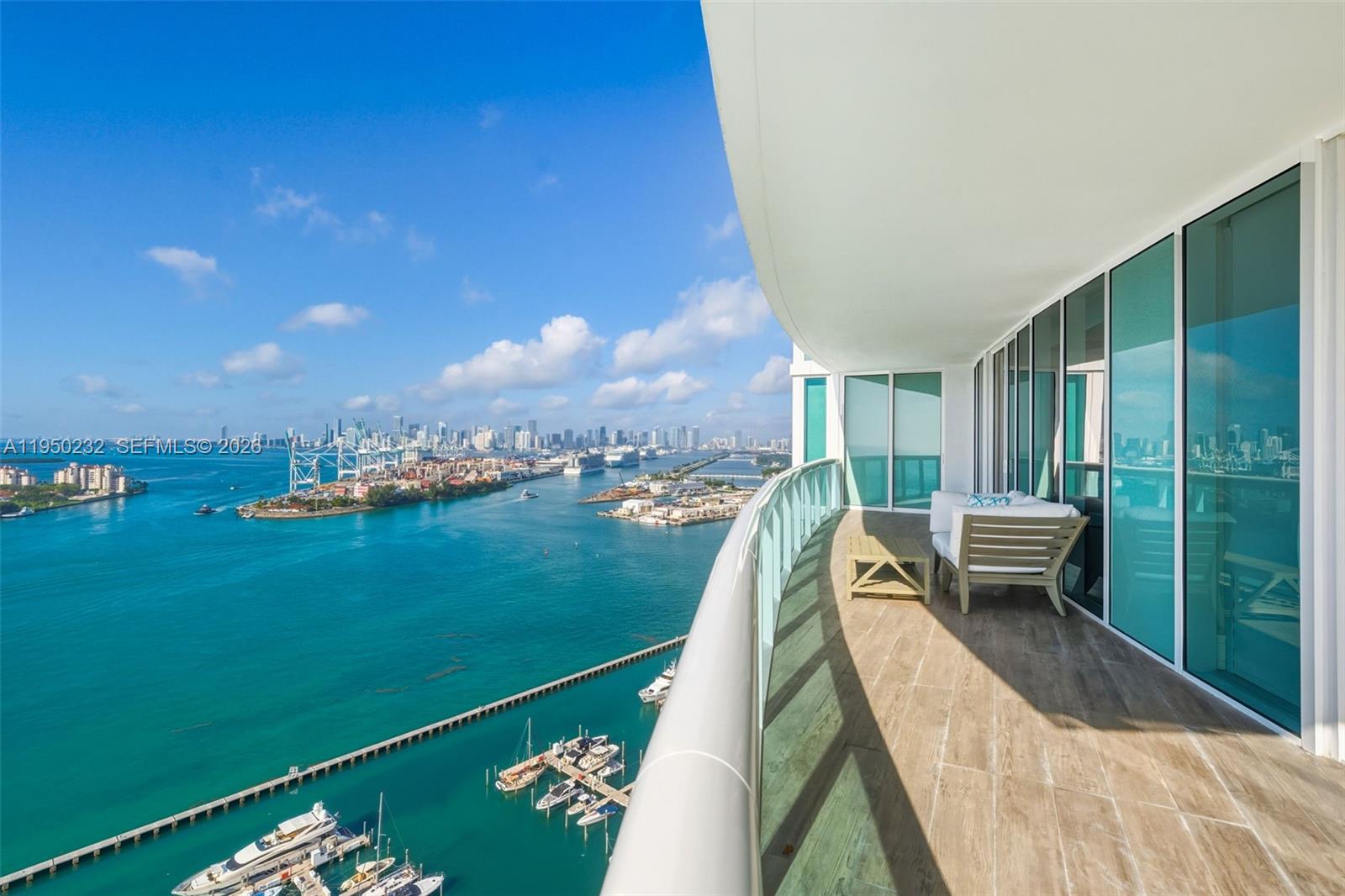 1000 South Pointe Drive, Unit 2802 Miami Beach, FL 33139 - Photo 34 of 44 a view of a lake from a balcony