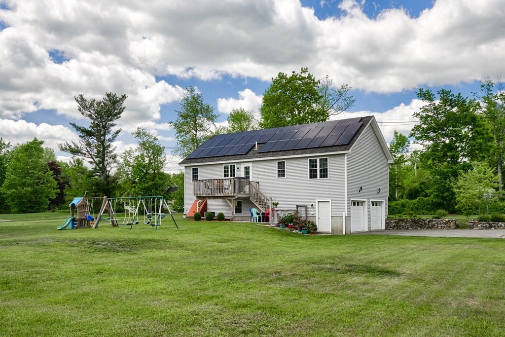 245 Pleasantdale Road Rutland, MA 01543 - Photo 20 of 24 a view of a house with a big yard