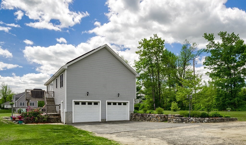 245 Pleasantdale Road Rutland, MA 01543 - Photo 22 of 24 a view of a house with backyard