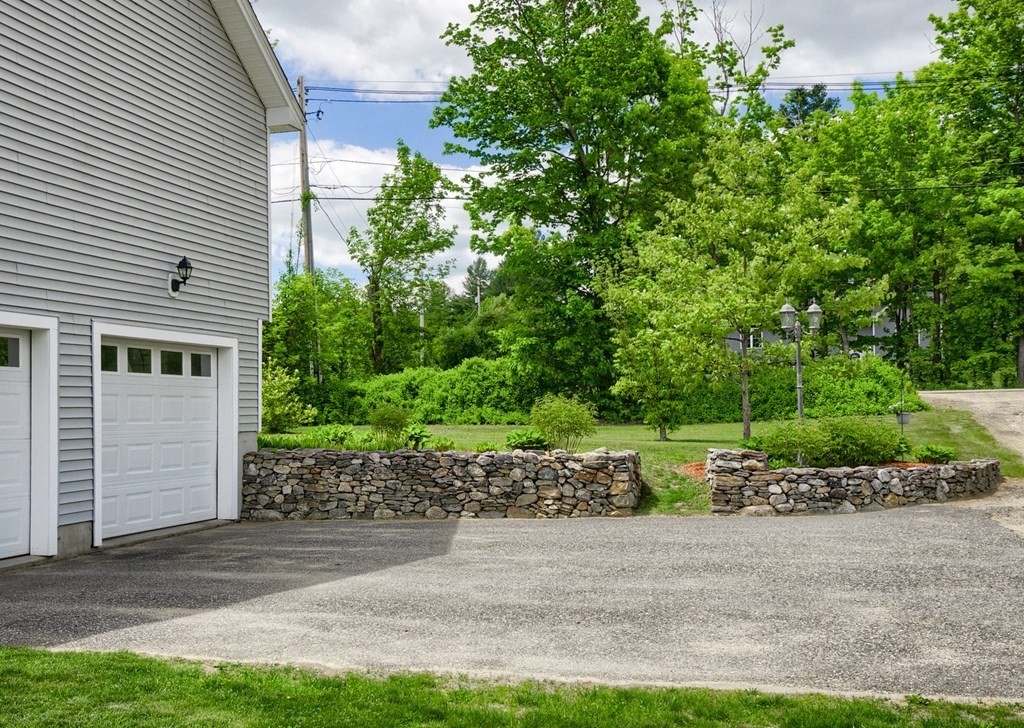 245 Pleasantdale Road Rutland, MA 01543 - Photo 23 of 24 a view of a yard with plants