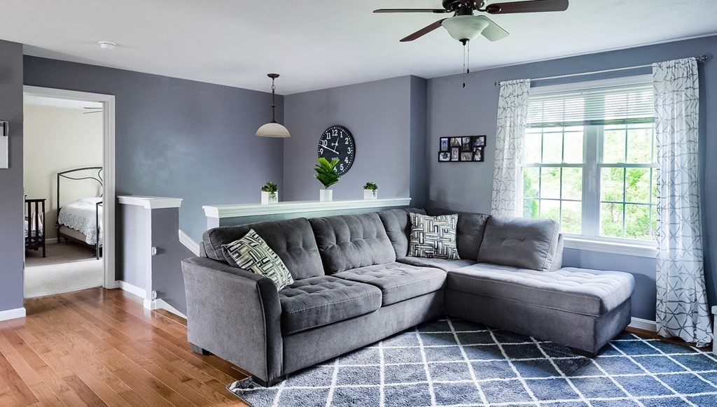 245 Pleasantdale Road Rutland, MA 01543 - Photo 7 of 24 a living room with furniture and a window