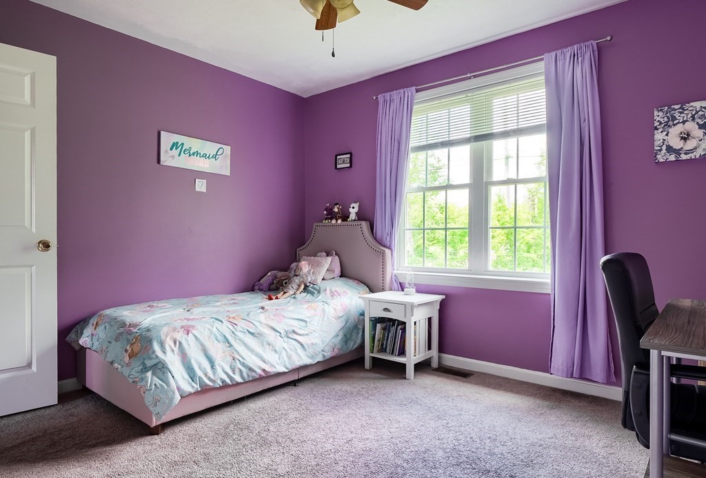 245 Pleasantdale Road Rutland, MA 01543 - Photo 10 of 24 a bedroom with a bed and a window