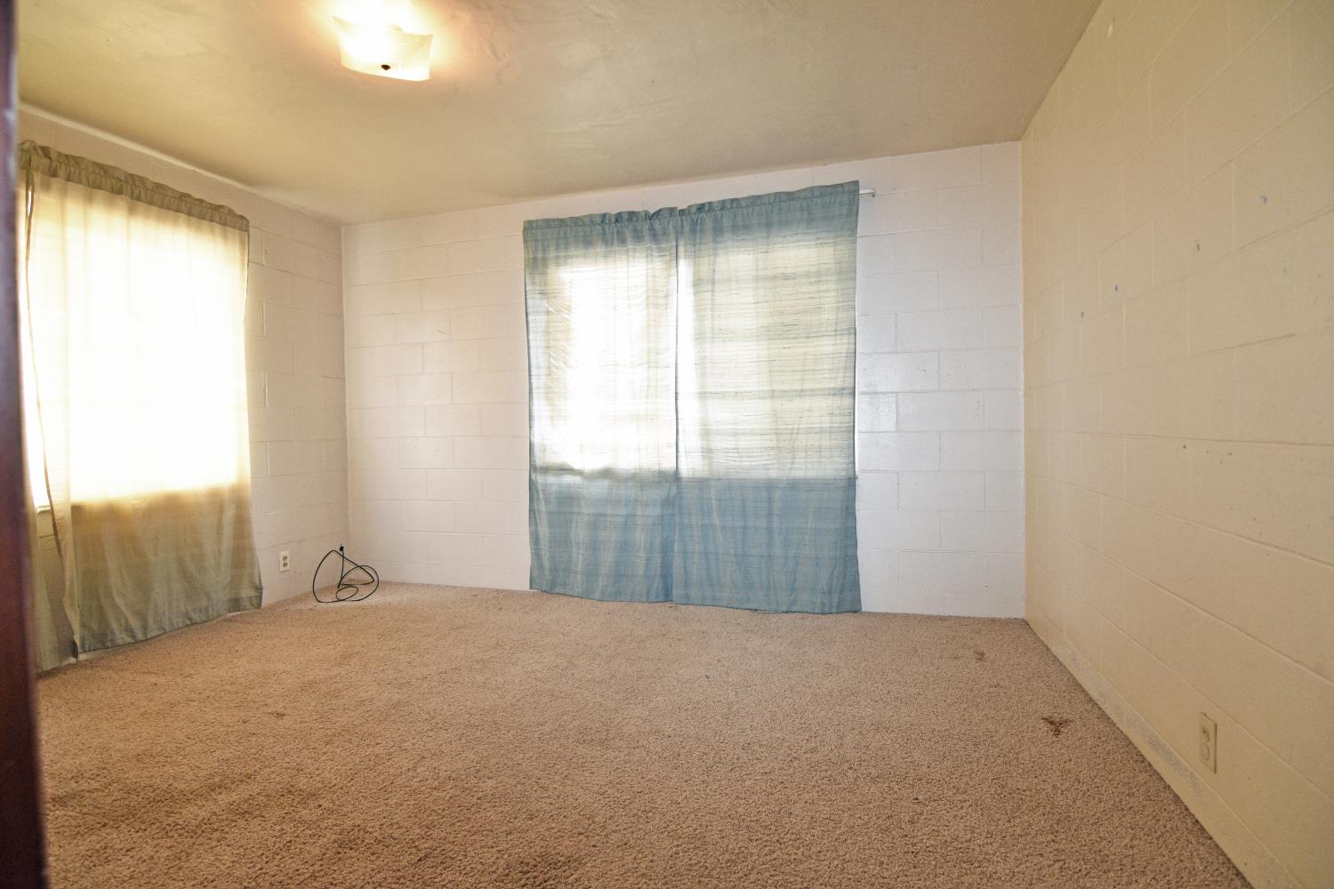 1206 South Verduga Road Turlock, CA 95380 - Photo 23 of 36 a view of an empty room with a window