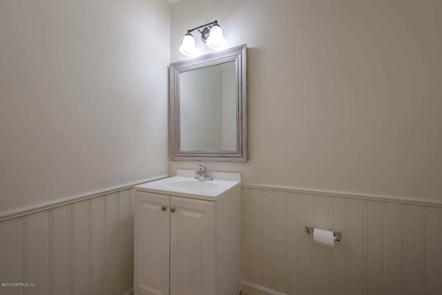 117 Tanager Road St. Augustine, FL 32086 - Photo 16 of 30 a bathroom with a sink and a mirror