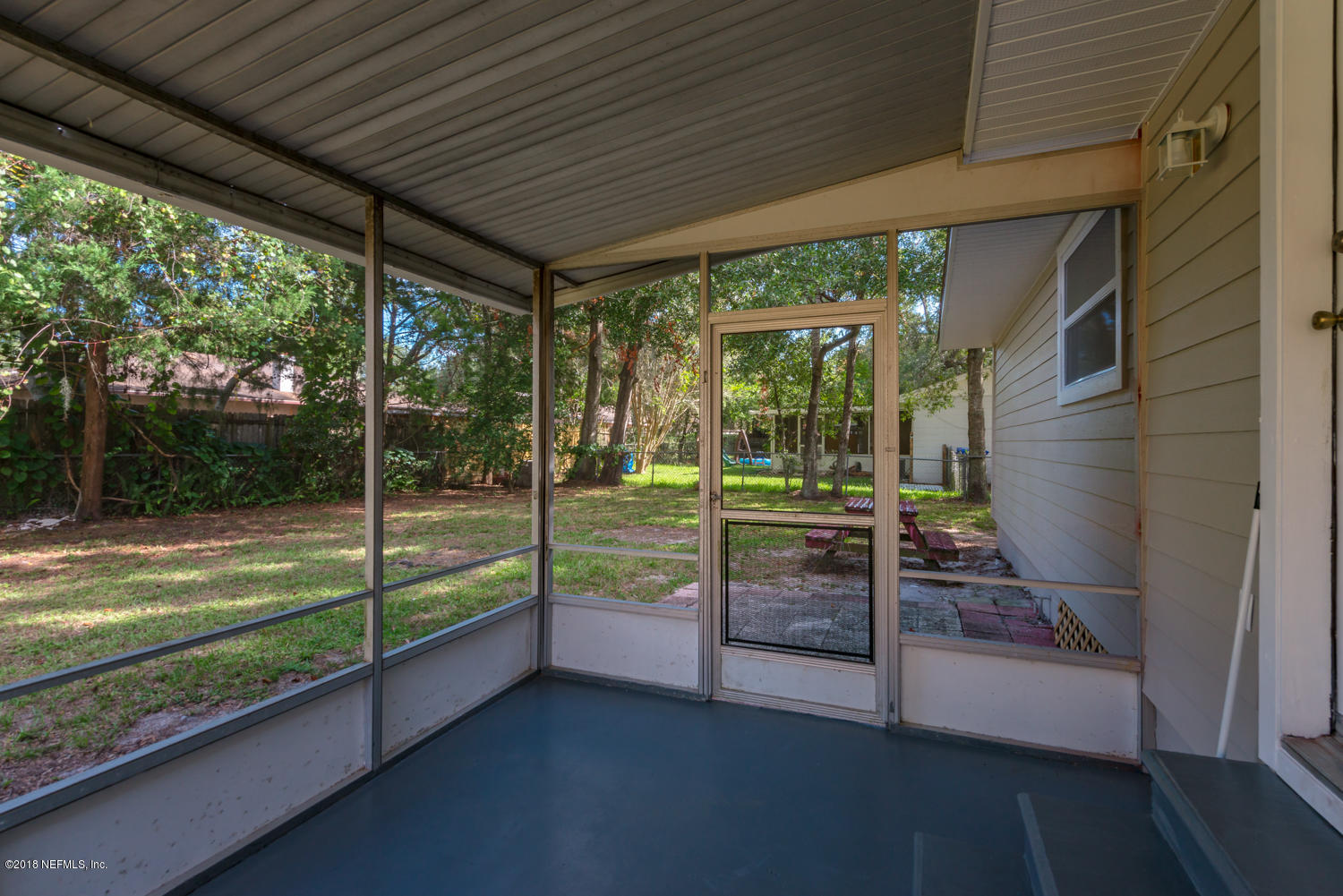 117 Tanager Road St. Augustine, FL 32086 - Photo 19 of 30 a view of a porch with a big yard