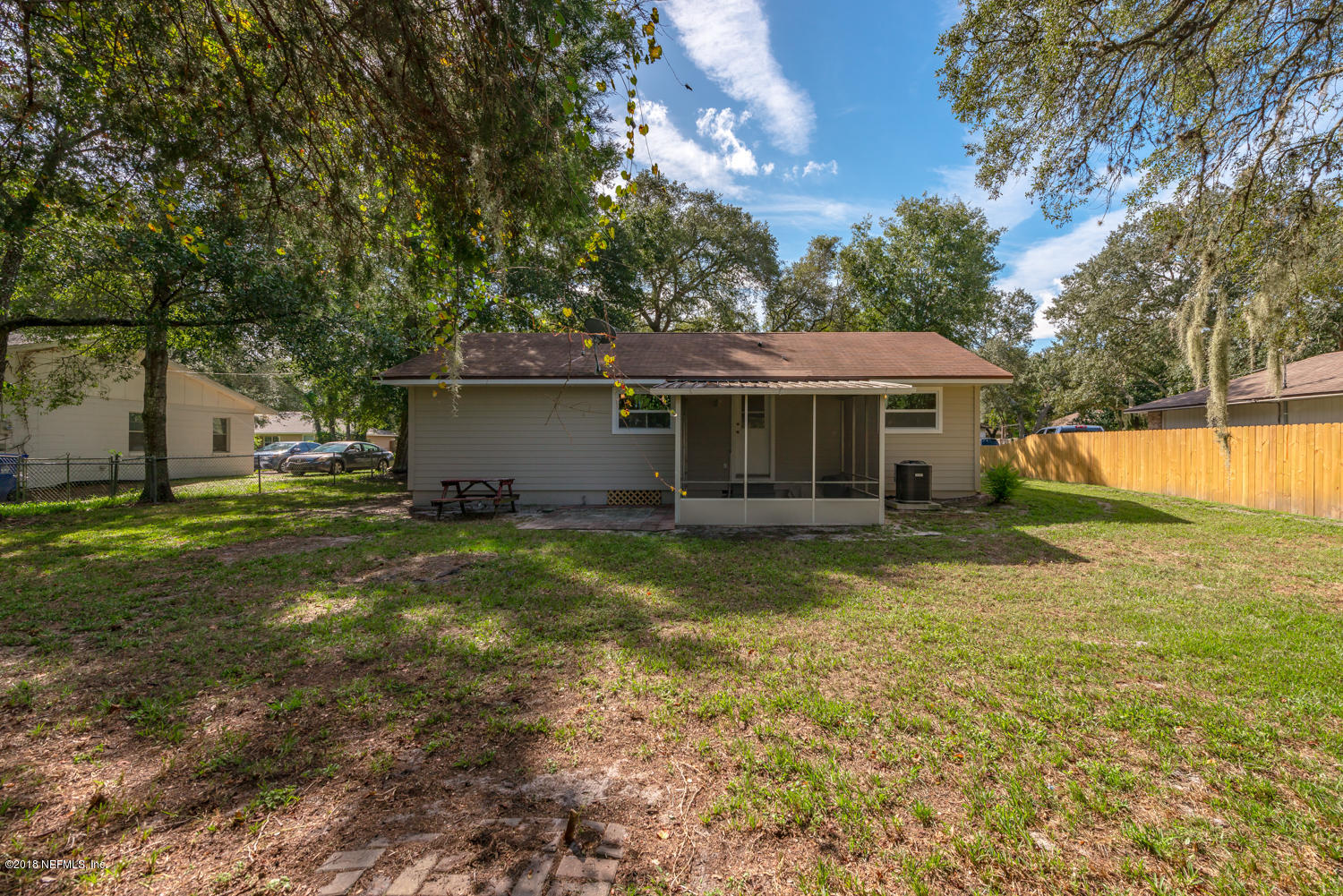 117 Tanager Road St. Augustine, FL 32086 - Photo 22 of 30 a view of a house with a yard