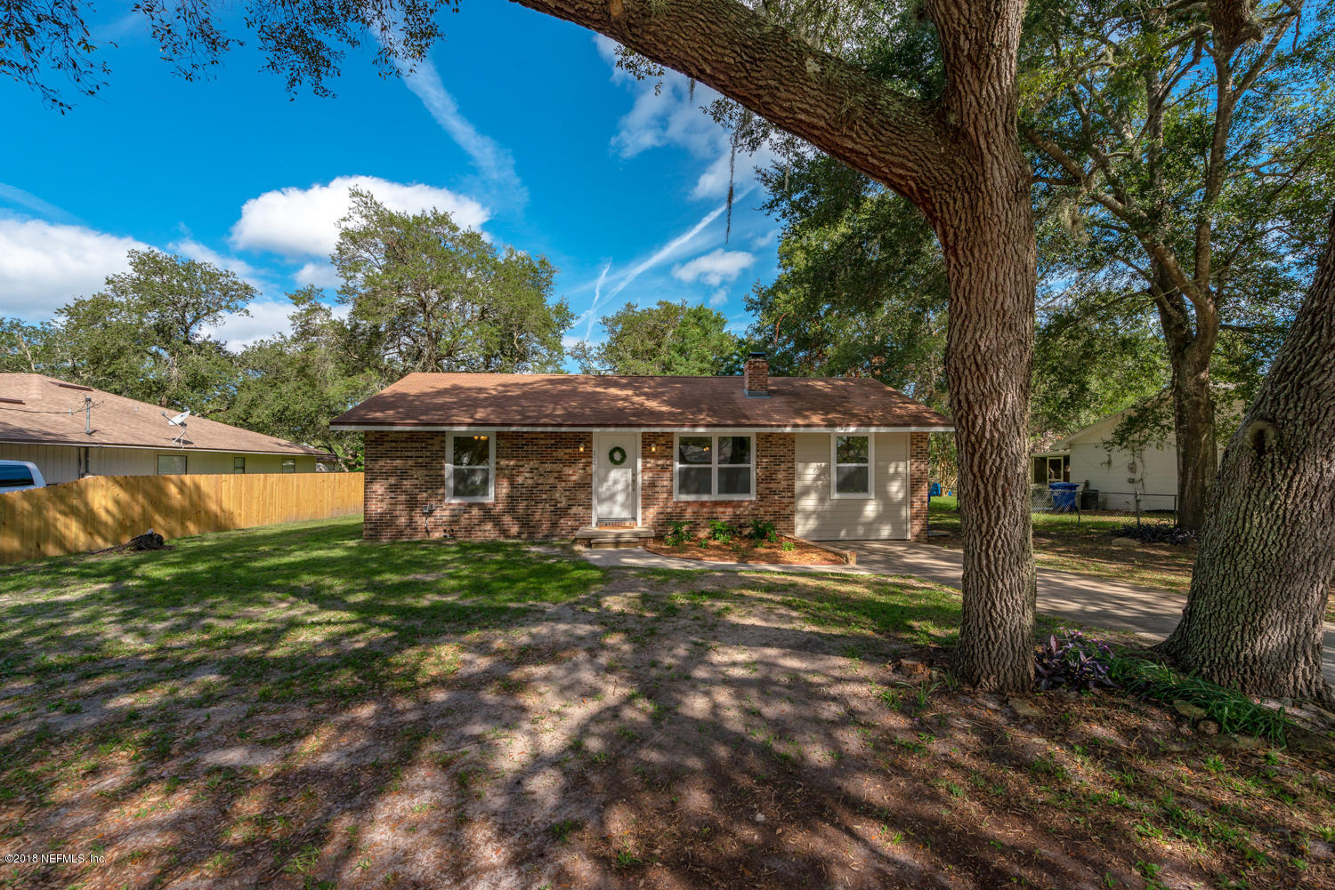 117 Tanager Road St. Augustine, FL 32086 - Photo 25 of 30 a view of a house with a yard