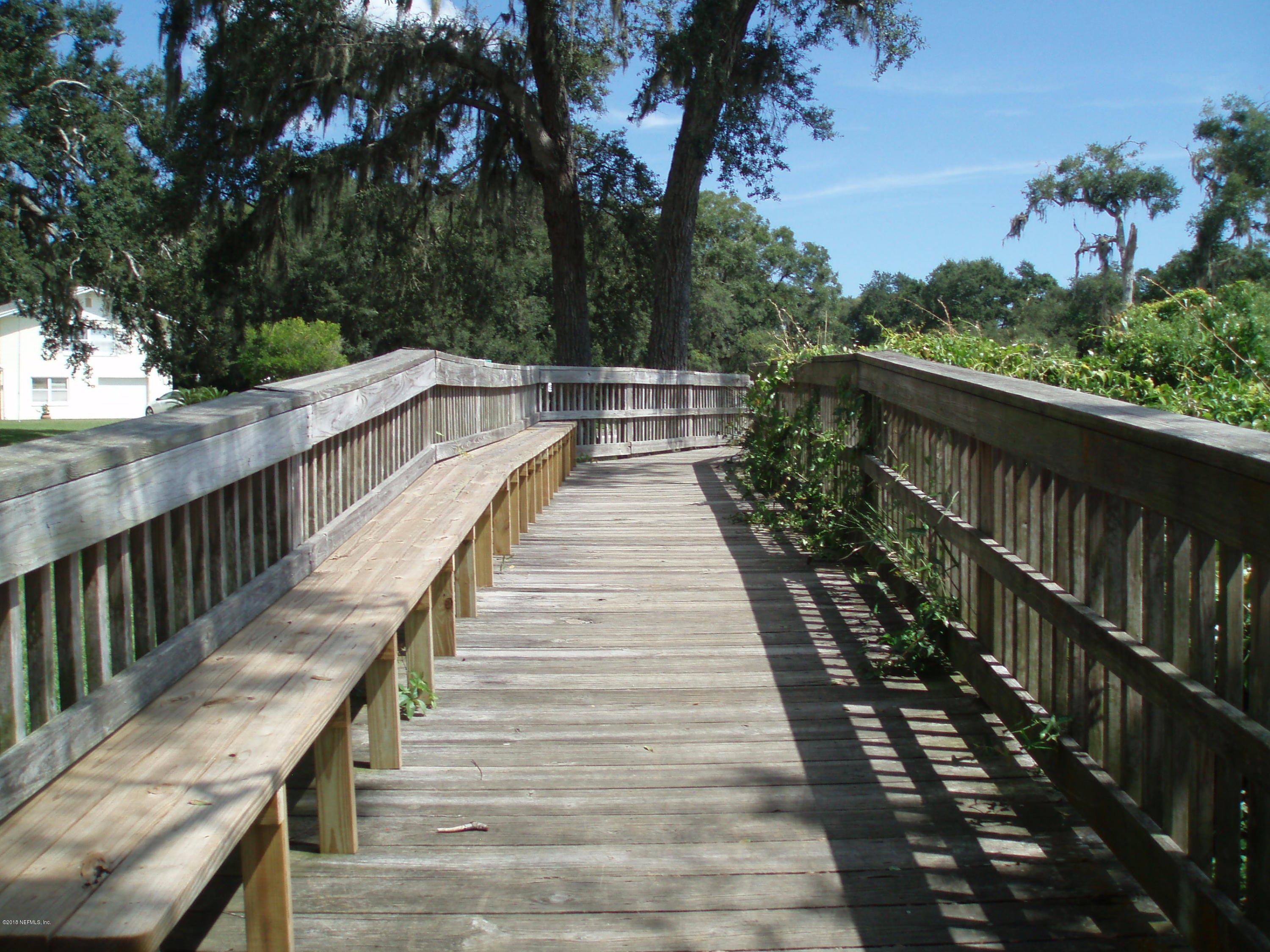 117 Tanager Road St. Augustine, FL 32086 - Photo 30 of 30 a view of balcony with wooden floor and fence