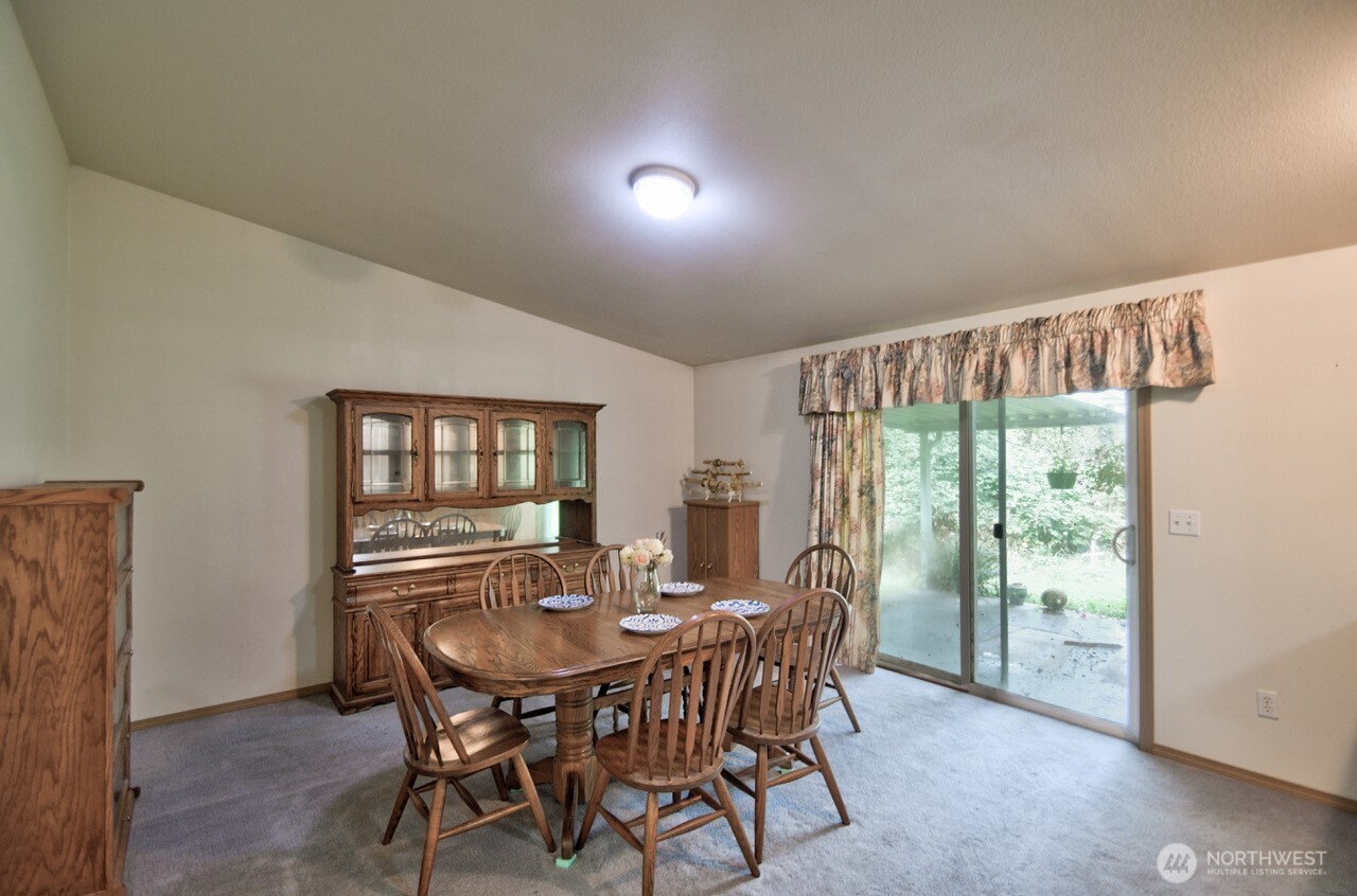 13920 Littlerock Road Southwest Rochester, WA 98579 - Photo 14 of 23 a view of a dining room with furniture window and outside view